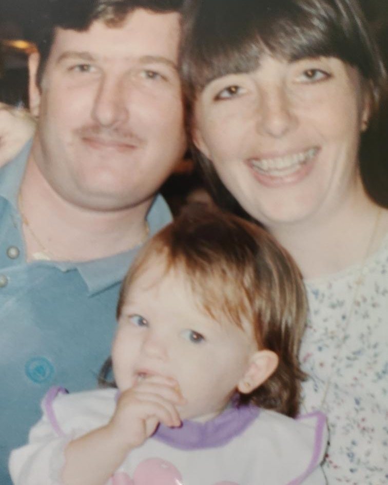 Ken and Tina with their baby daughter