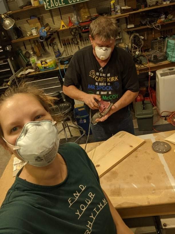 Masks on, sawdust everywhere